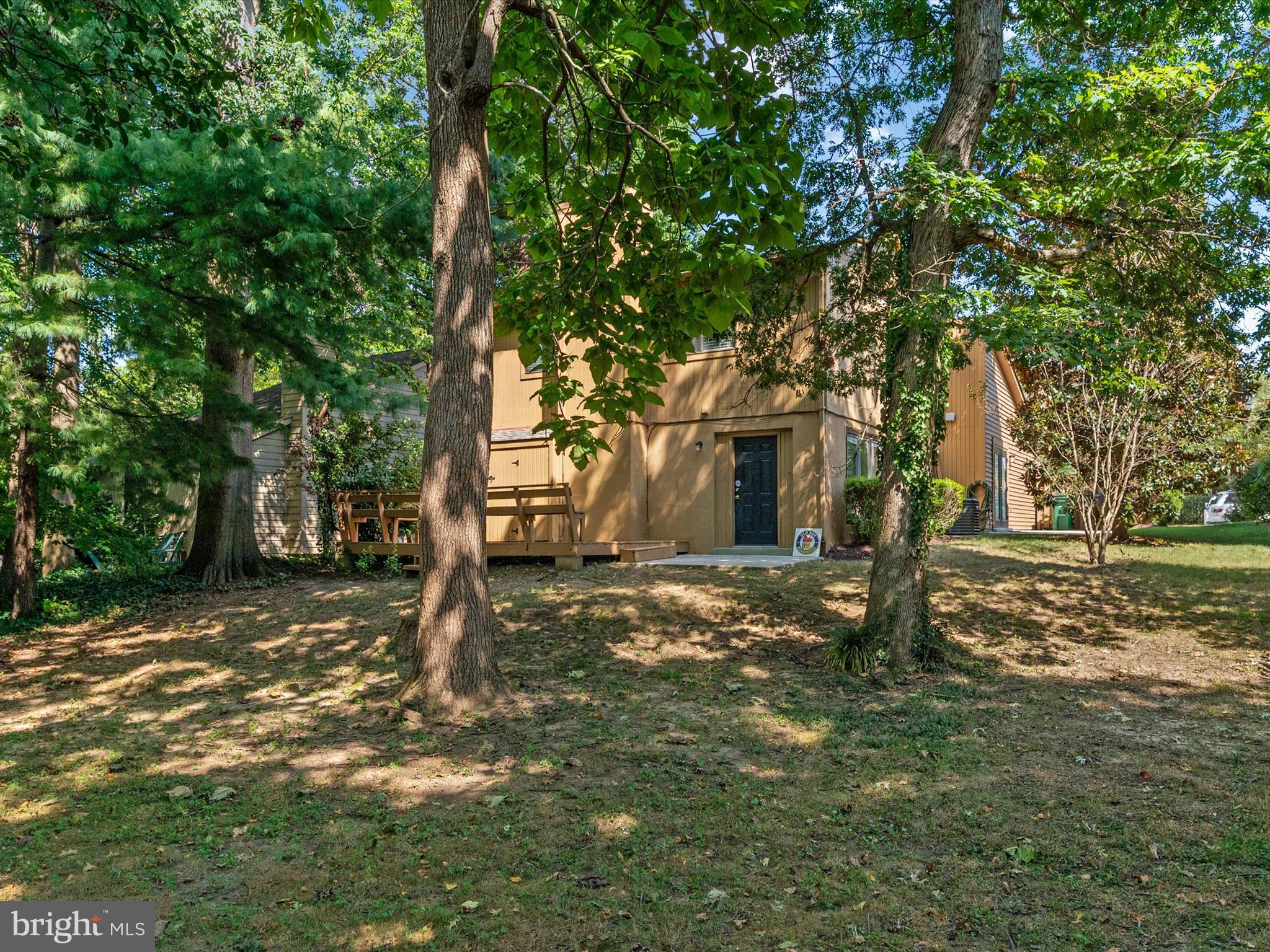 1411 Stonecreek Road Annapolis, MD 21403 - Photo 37 of 38 a view of a yard with plants and trees
