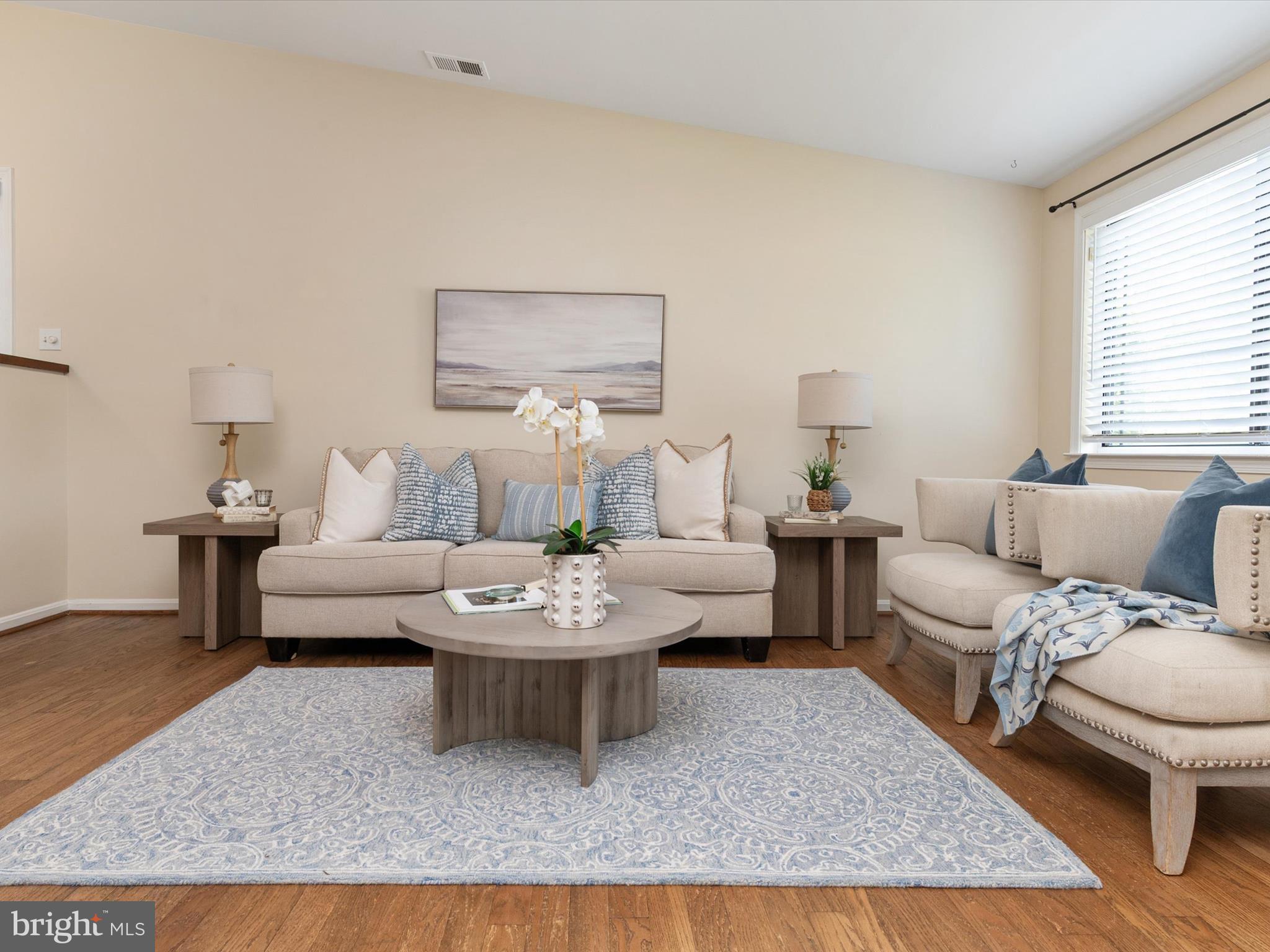 1411 Stonecreek Road Annapolis, MD 21403 - Photo 10 of 38 a living room with furniture and a rug