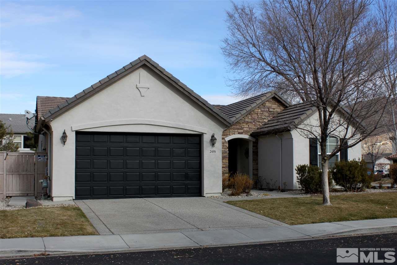 2495 Spring Flower Drive Reno, NV 89521 - Photo 1 of 30 a front view of a house with garage