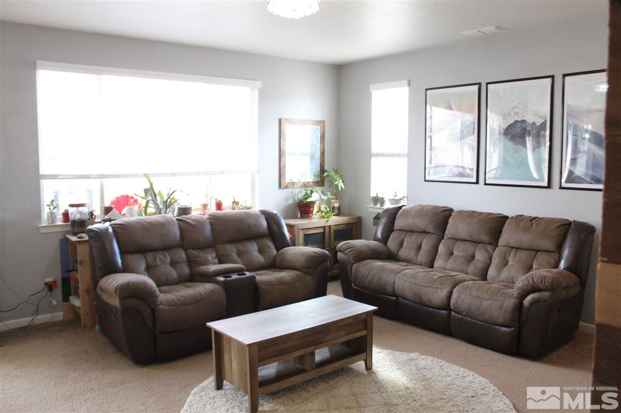 2495 Spring Flower Drive Reno, NV 89521 - Photo 11 of 30 a living room with furniture and a large window