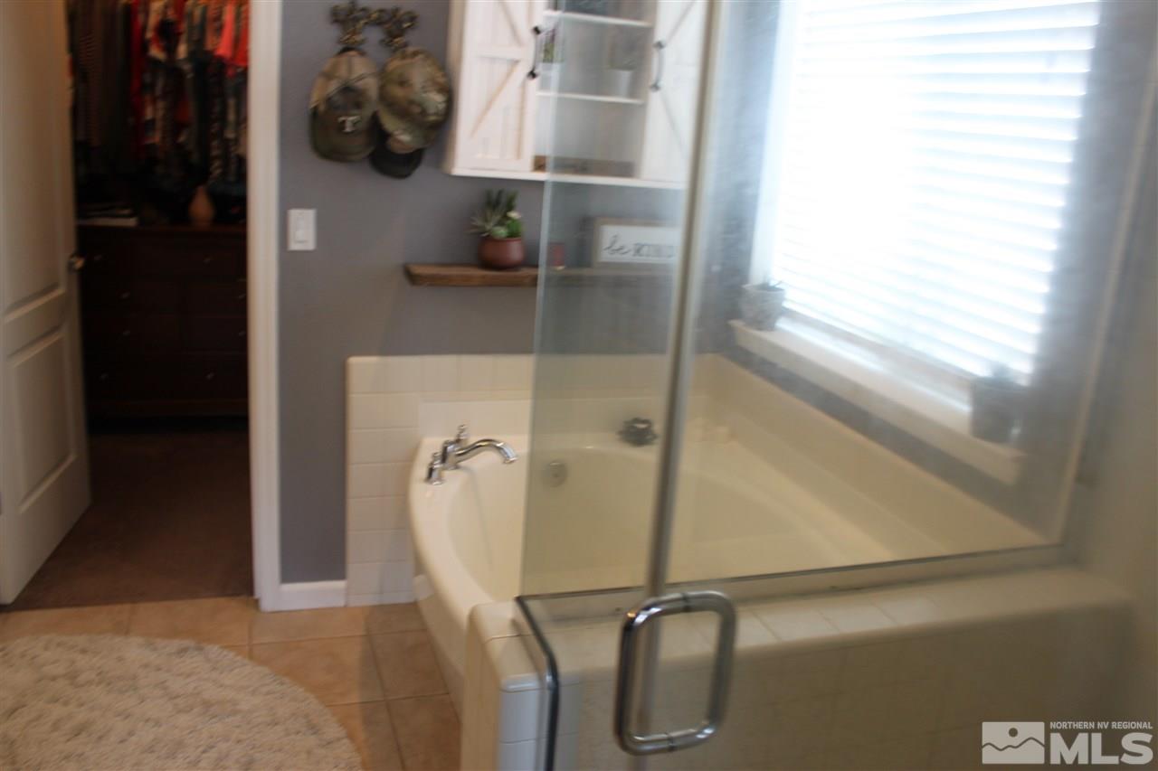 2495 Spring Flower Drive Reno, NV 89521 - Photo 18 of 30 a bathroom with a shower
