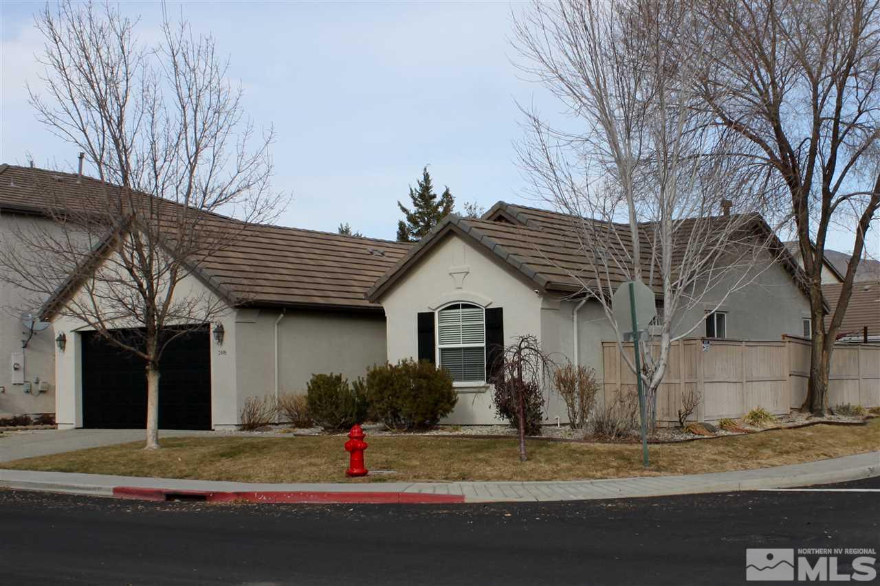 2495 Spring Flower Drive Reno, NV 89521 - Photo 30 of 30 a view of a house with a yard and large tree