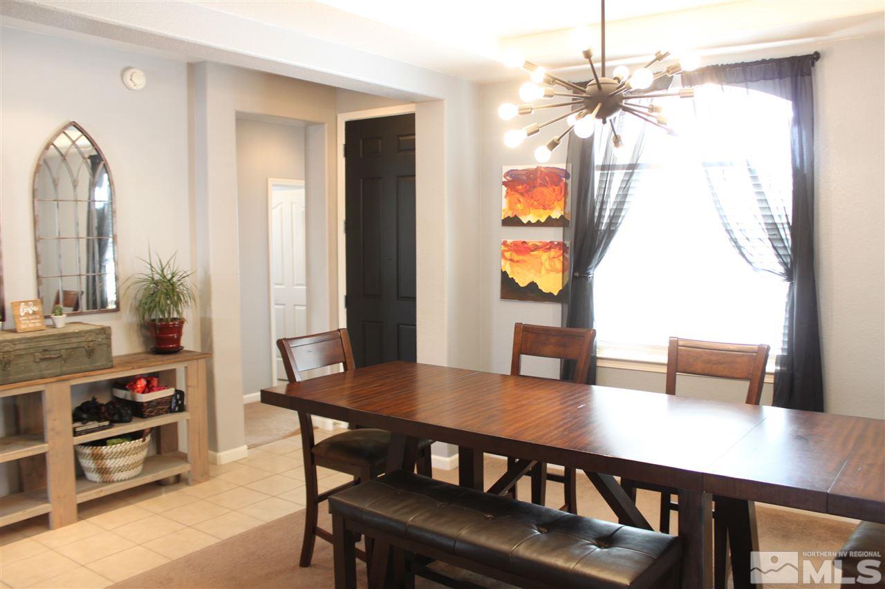 2495 Spring Flower Drive Reno, NV 89521 - Photo 4 of 30 a view of a dining room with furniture and window