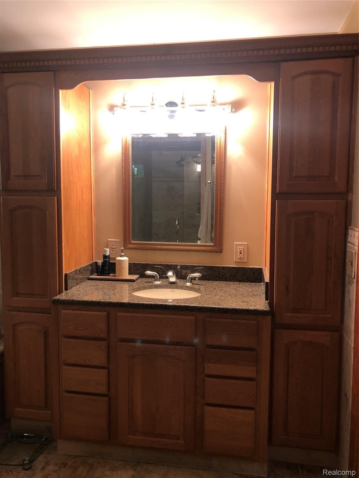1750 Brewer Road Leonard, MI 48367 - Photo 37 of 67 Brewer Master Bath vanity.jpg