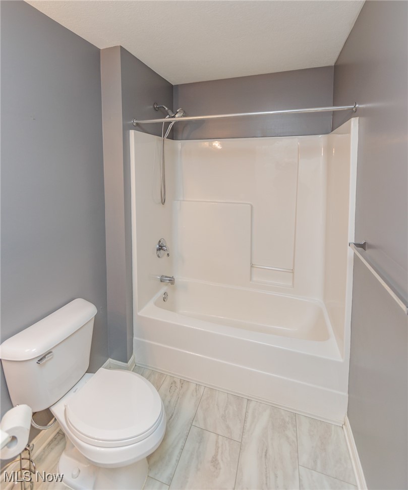 28360 Center Ridge Road, Unit 2210 Westlake, OH 44145 - Photo 28 of 45 Bathroom with shower combination and toilet