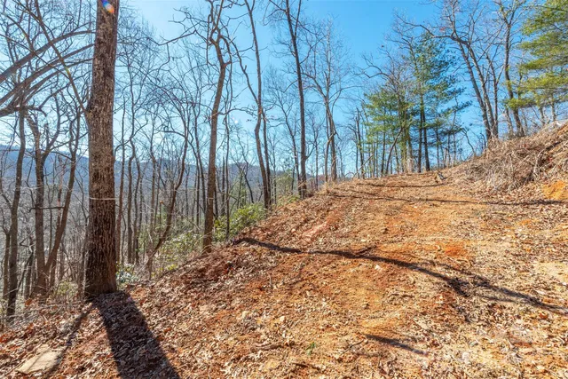 a view of wooden fence covered with snow