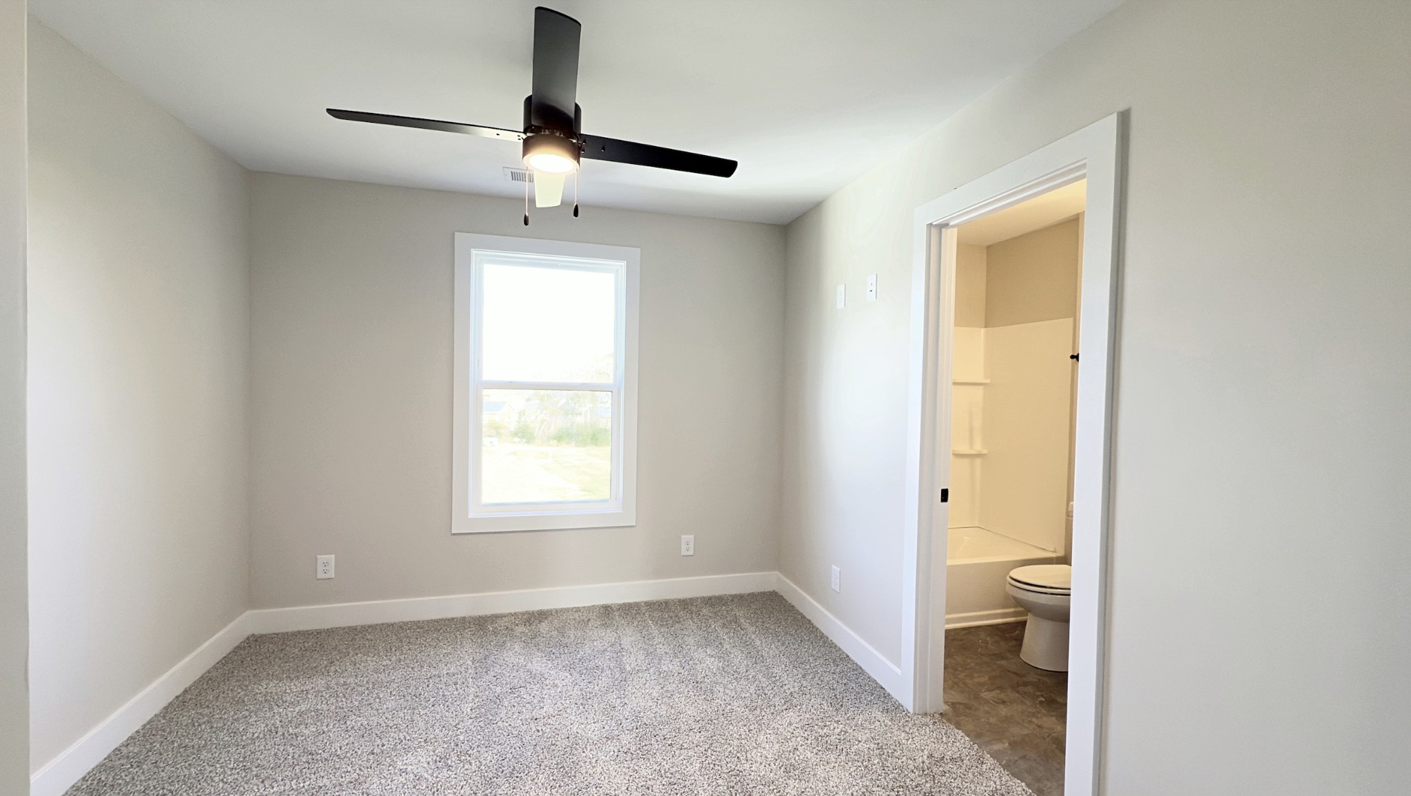 305 Pollard Road, Unit B Clarksville, TN 37042 - Photo 11 of 15 a view of an empty room with a window