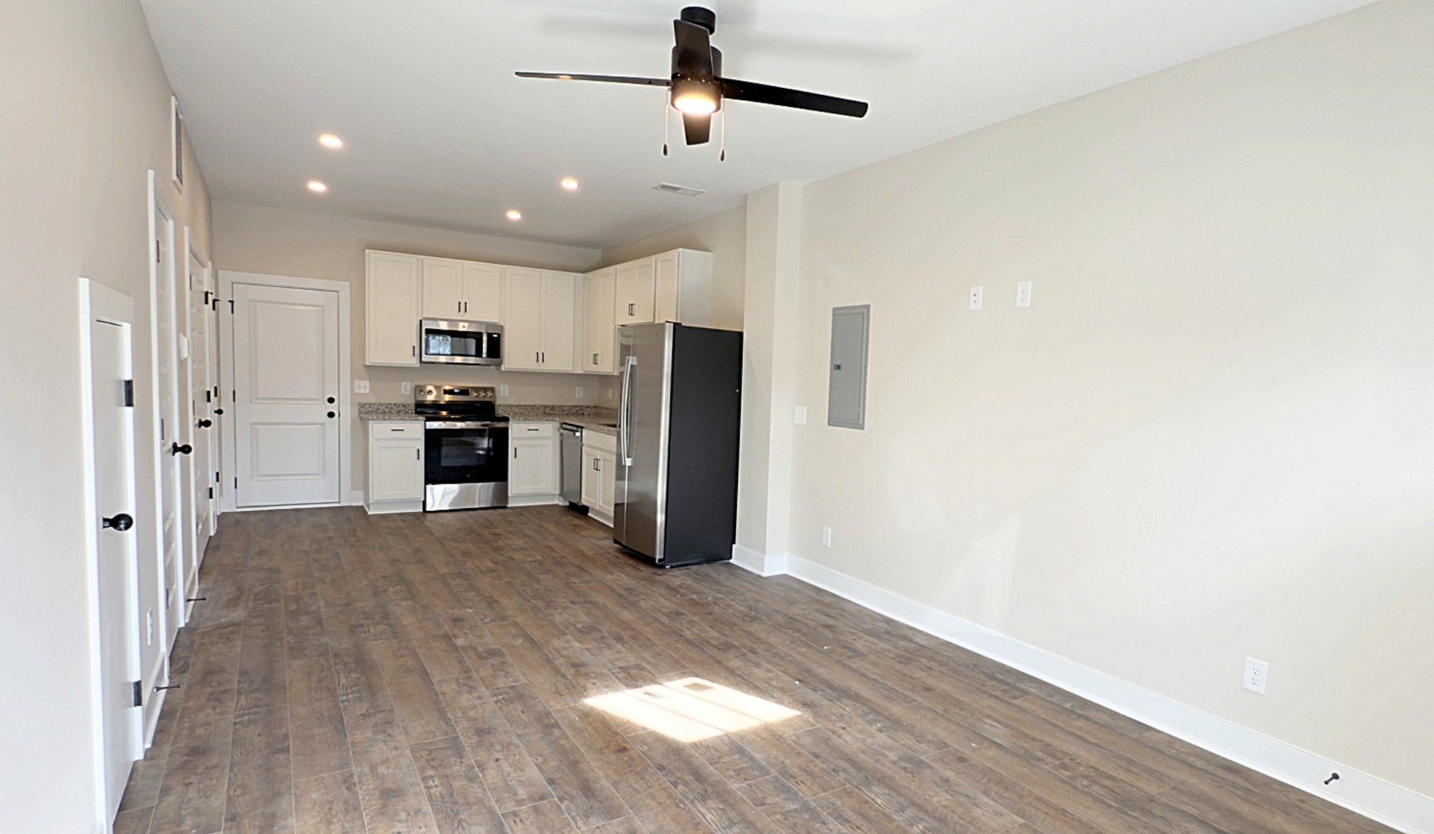 305 Pollard Road, Unit B Clarksville, TN 37042 - Photo 2 of 15 a view of a kitchen with a sink and a refrigerator