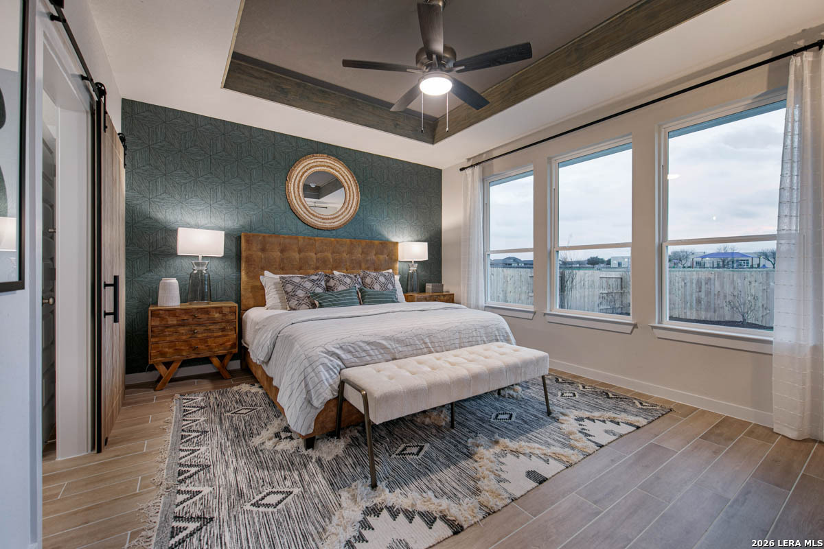 146 Stream Street Seguin, TX 78155 - Photo 20 of 27 a bedroom with a bed and a window