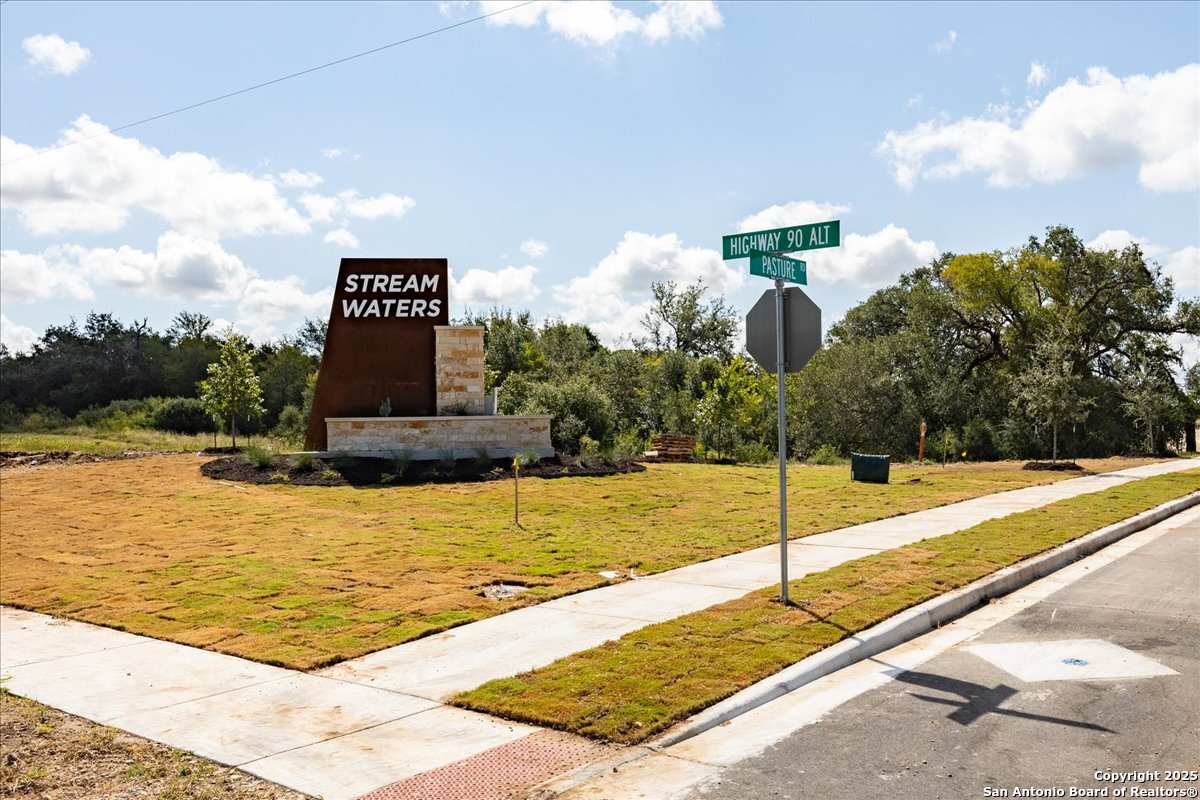 146 Stream Street Seguin, TX 78155 - Photo 23 of 27 a view of a swimming pool with a lounge chairs