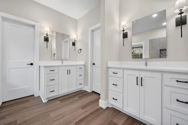 a view of a dresser with wooden floor