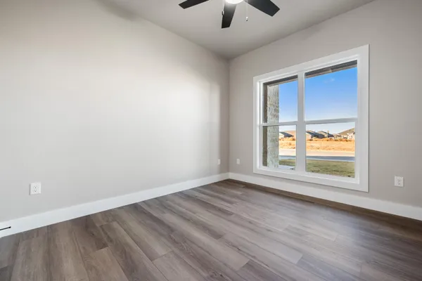 a bathroom with a double vanity sink mirror and bathtub