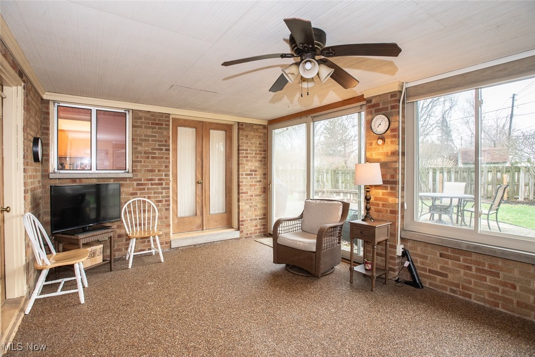 13740 Old Pleasant Valley Road Cleveland, OH 44130 - Photo 13 of 28 Sunroom with brick wall