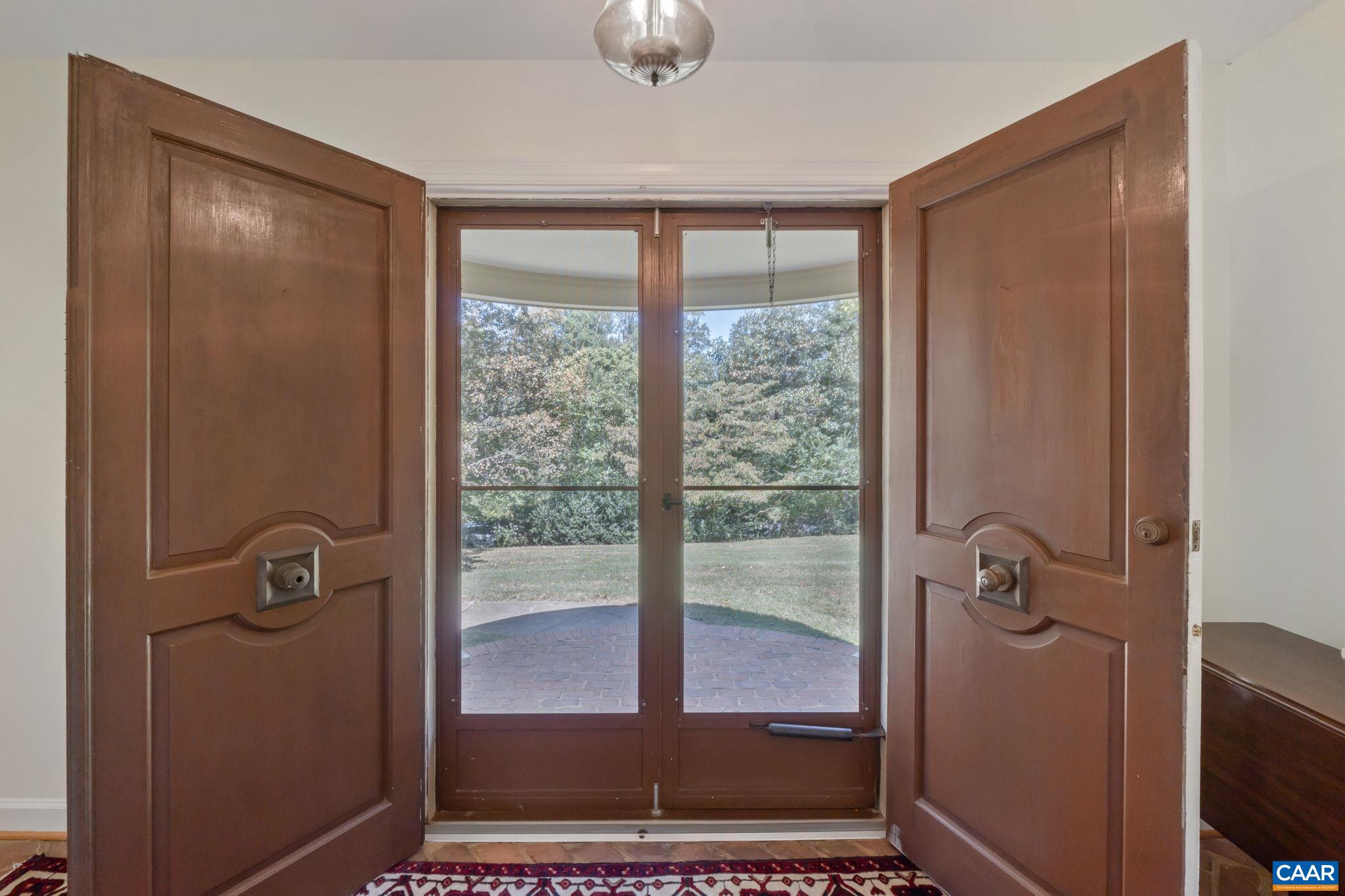 311 Gloucester Road Charlottesville, VA 22901 - Photo 6 of 55 a bathroom with a glass shower door