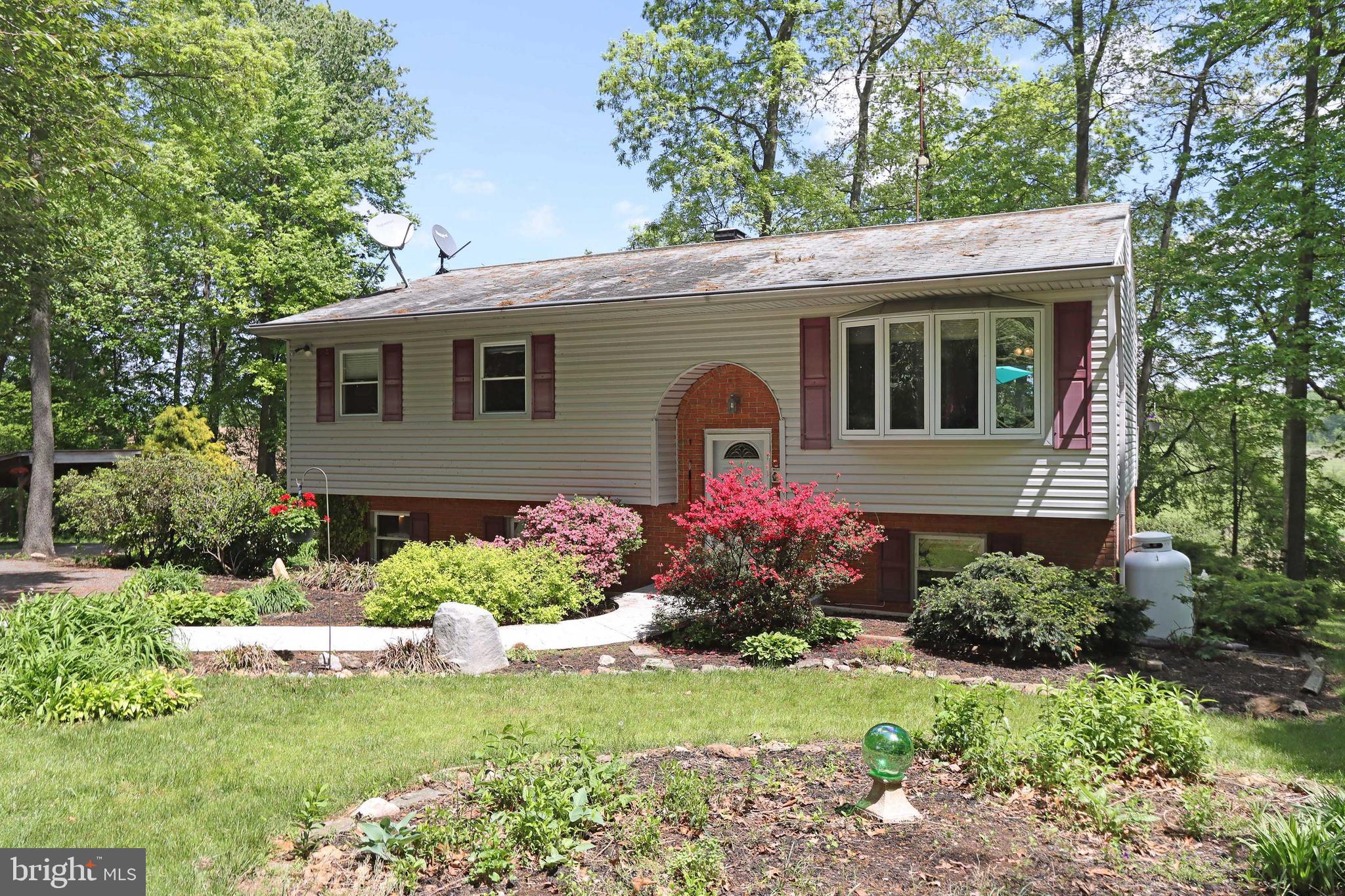 915 Emory Church Road Upperco, MD 21155 - Photo 2 of 47 Color and comfort greet you
