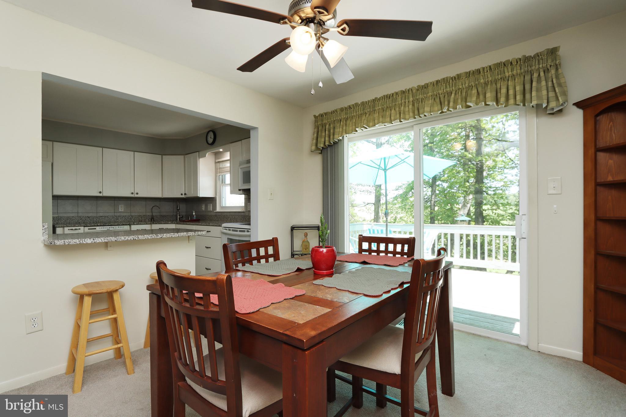 915 Emory Church Road Upperco, MD 21155 - Photo 6 of 47 And the dining room looks out over the deck