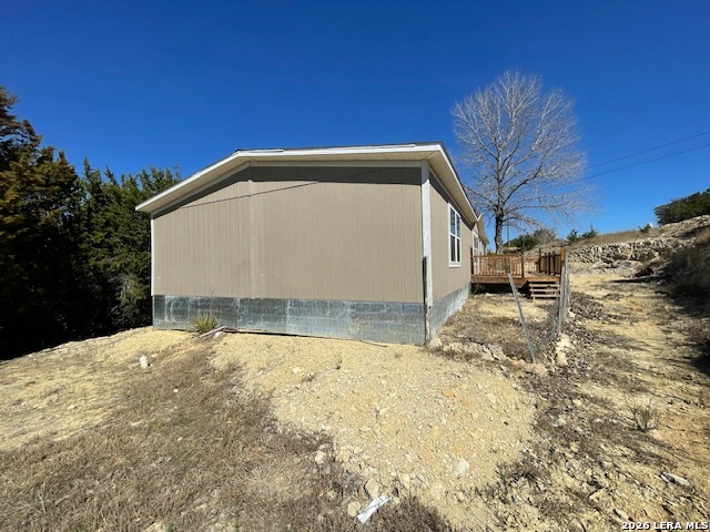 207 Hopi Trail Bandera, TX 78003 - Photo 21 of 21 a view of backyard of house