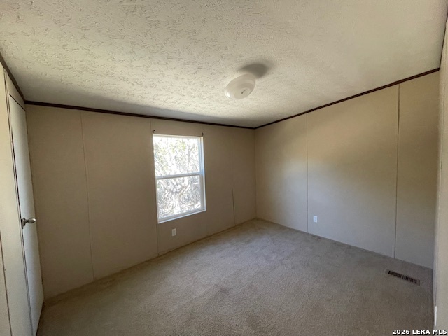 207 Hopi Trail Bandera, TX 78003 - Photo 7 of 21 an empty room with windows