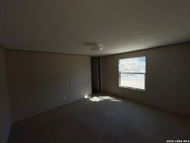 207 Hopi Trail Bandera, TX 78003 - Photo 9 of 21 a view of an empty room and window