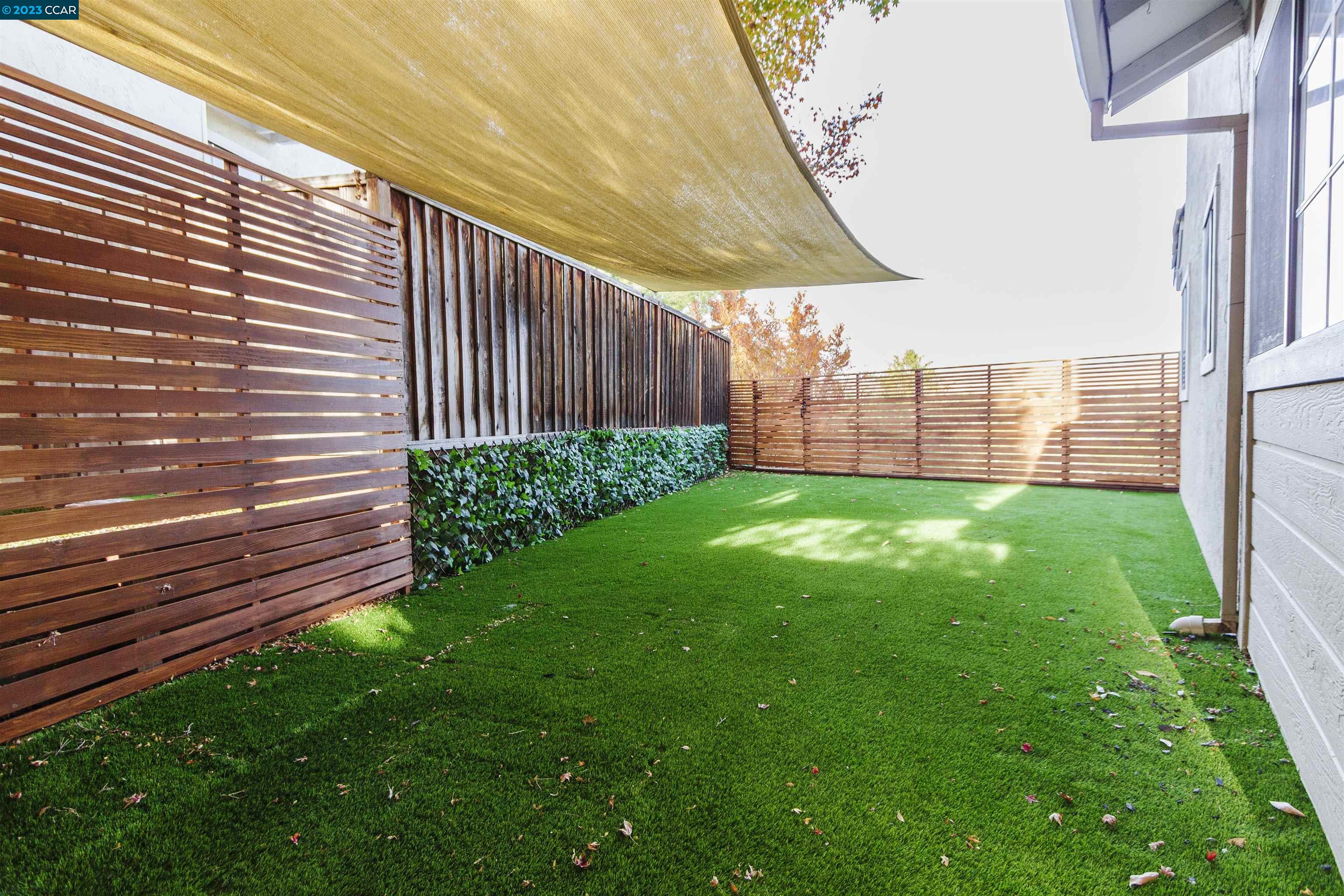 5291 Pebble Glen Drive Concord, CA 94521 - Photo 17 of 21 a view of a back yard of the house