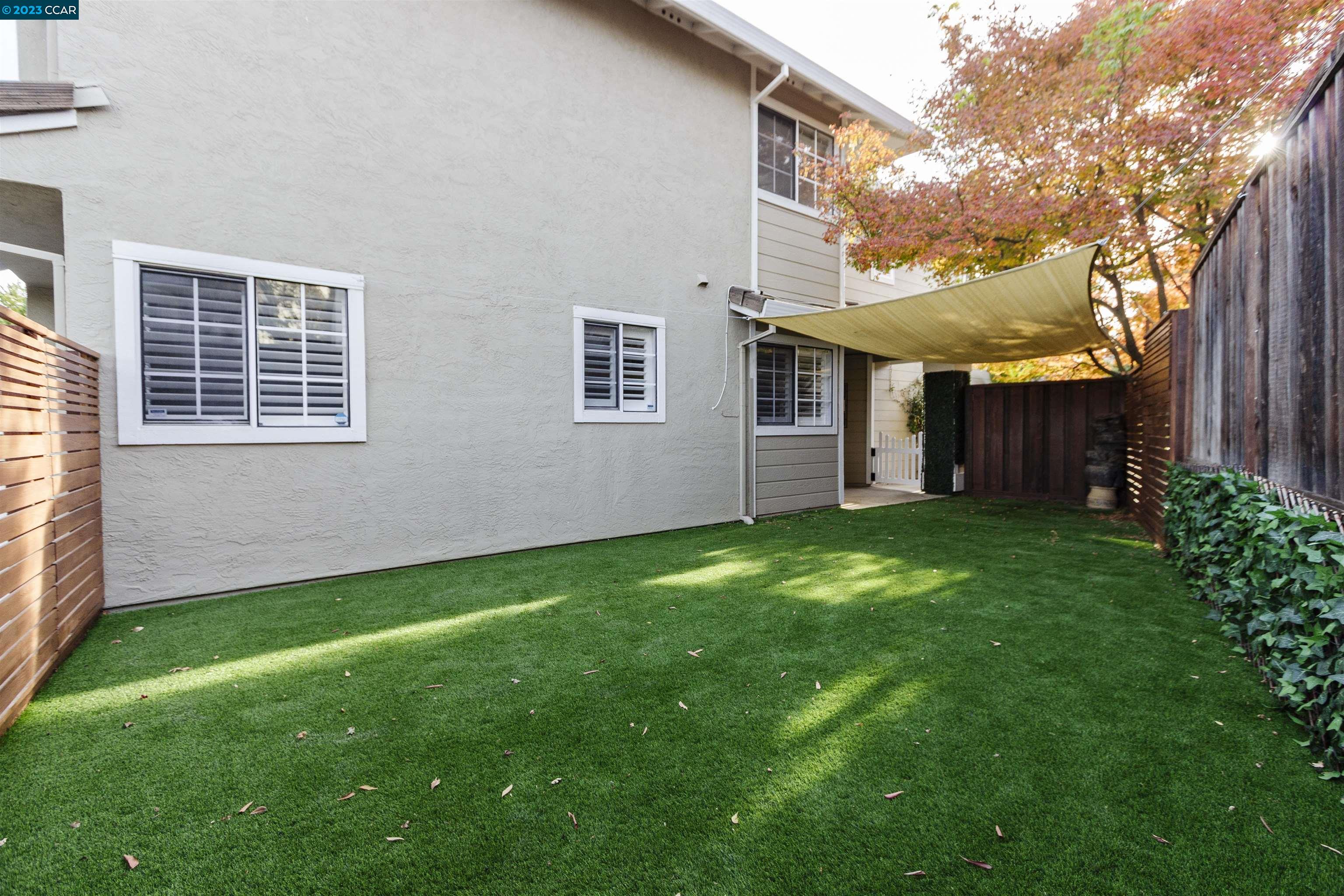 5291 Pebble Glen Drive Concord, CA 94521 - Photo 18 of 21 a backyard of a house with lots of green space