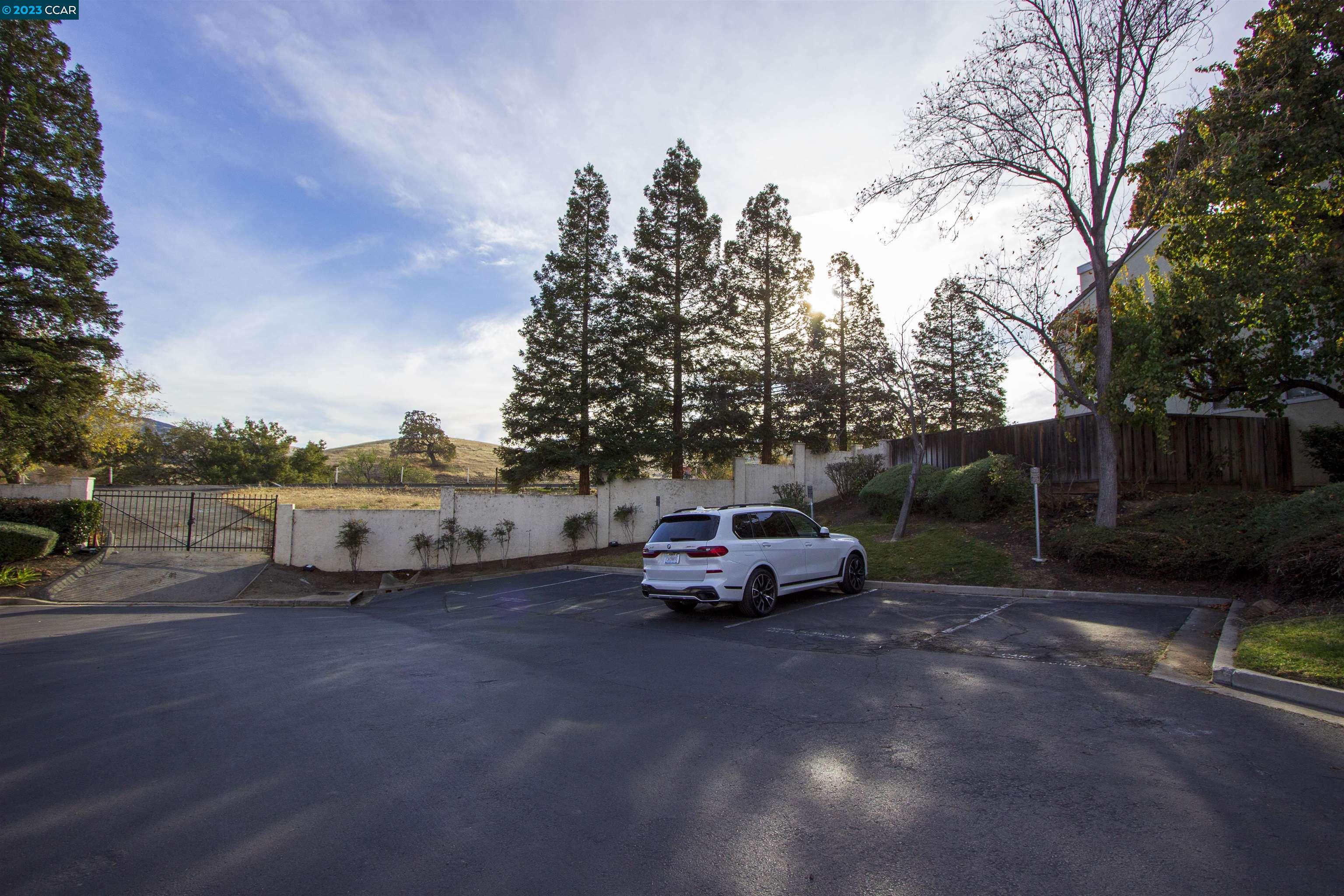 5291 Pebble Glen Drive Concord, CA 94521 - Photo 21 of 21 a car parked in front of a house