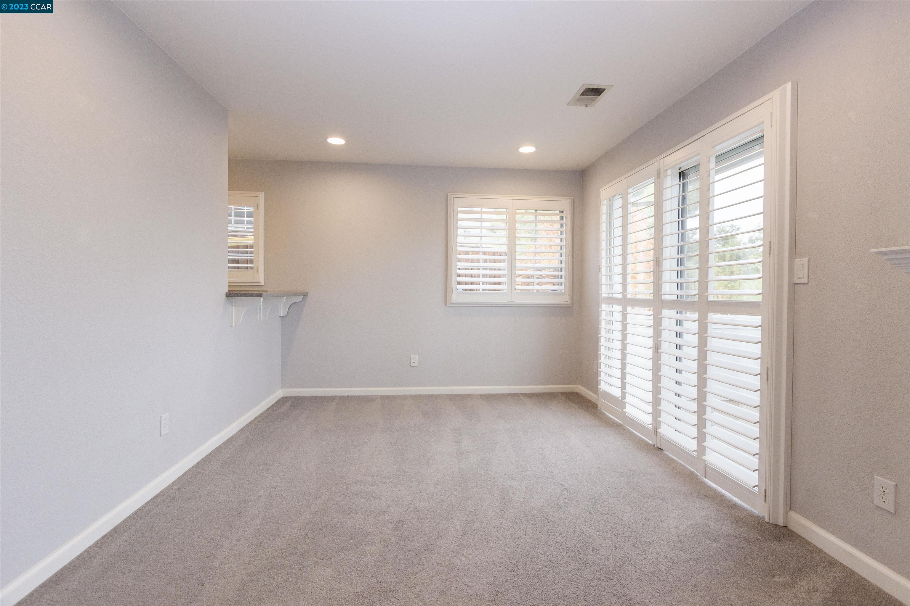 5291 Pebble Glen Drive Concord, CA 94521 - Photo 4 of 21 a view of an empty room with a window