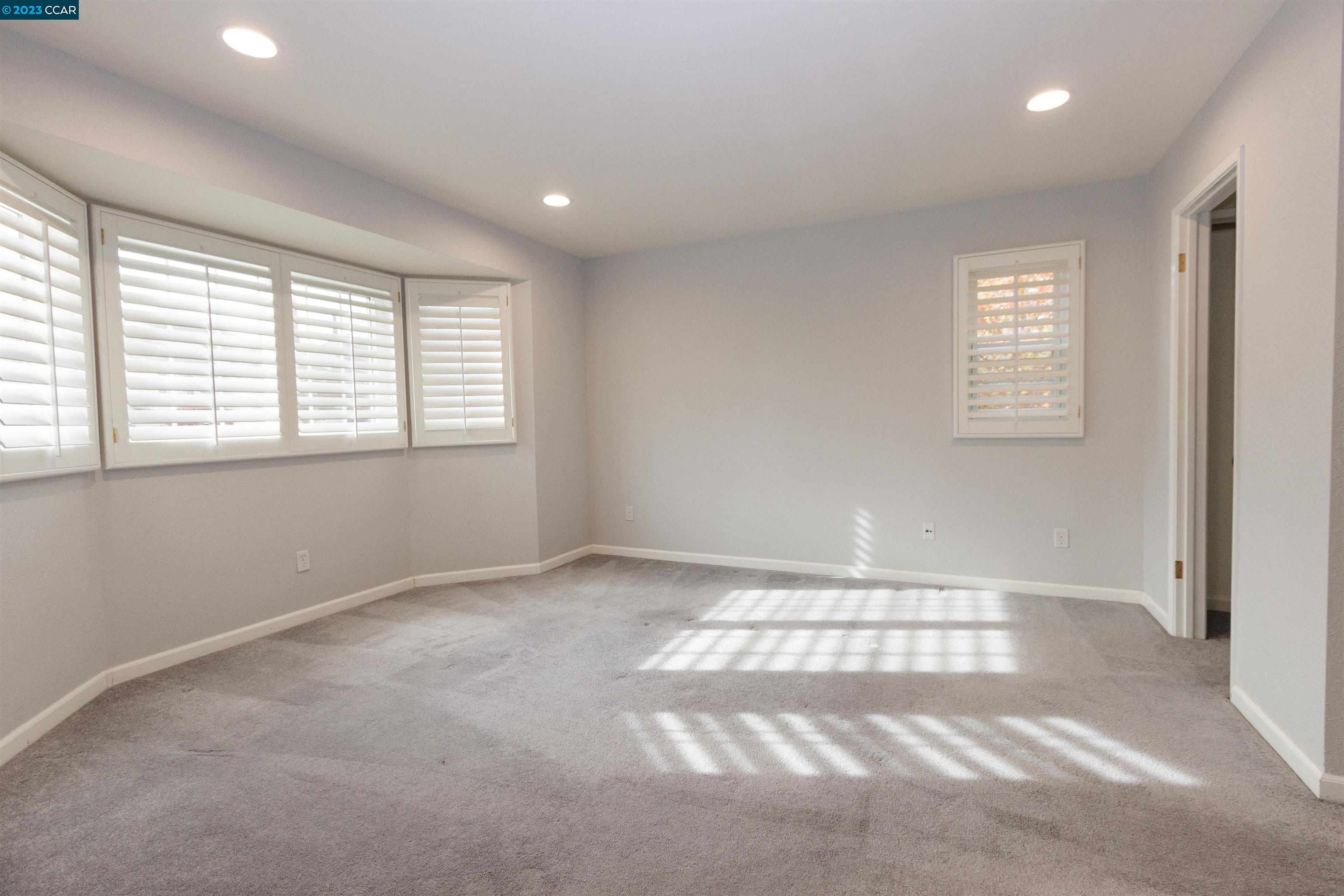 5291 Pebble Glen Drive Concord, CA 94521 - Photo 8 of 21 a view of an empty room and window