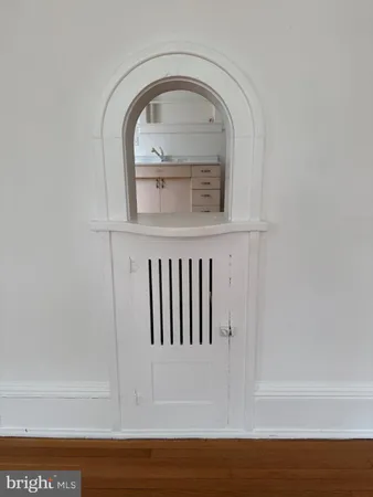 a view of wooden floor with a sink