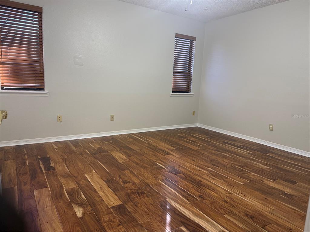 11711 Ridgeview Lane Seminole, FL 33772 - Photo 18 of 30 an empty room with a window