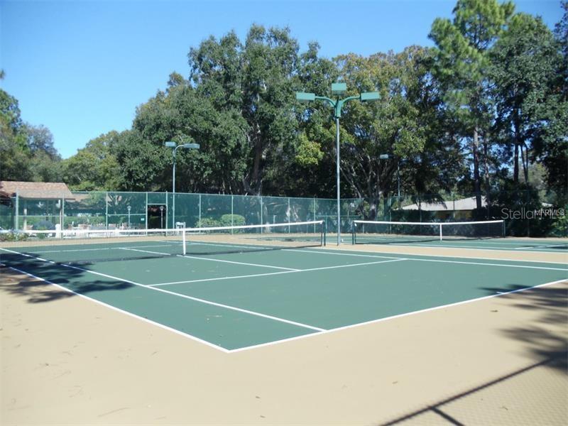 11711 Ridgeview Lane Seminole, FL 33772 - Photo 28 of 30 a view of a tennis court