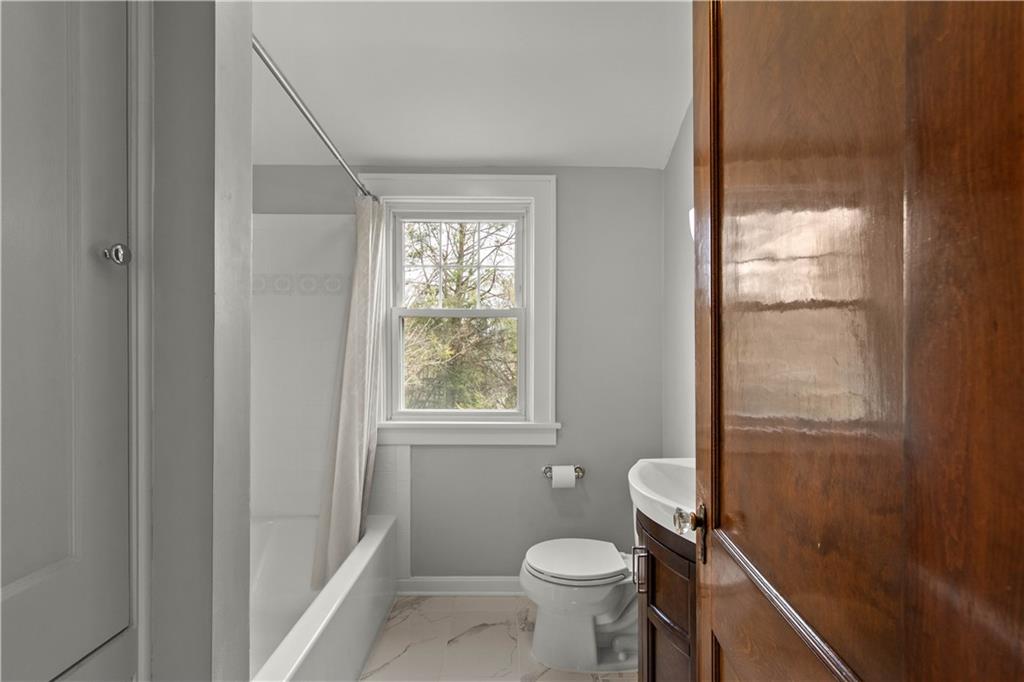 705 Walnut Street Crescent, PA 15046 - Photo 28 of 41 a bathroom with a sink toilet and tub