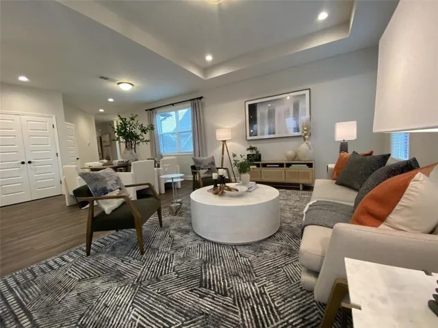 a living room with furniture and a couch