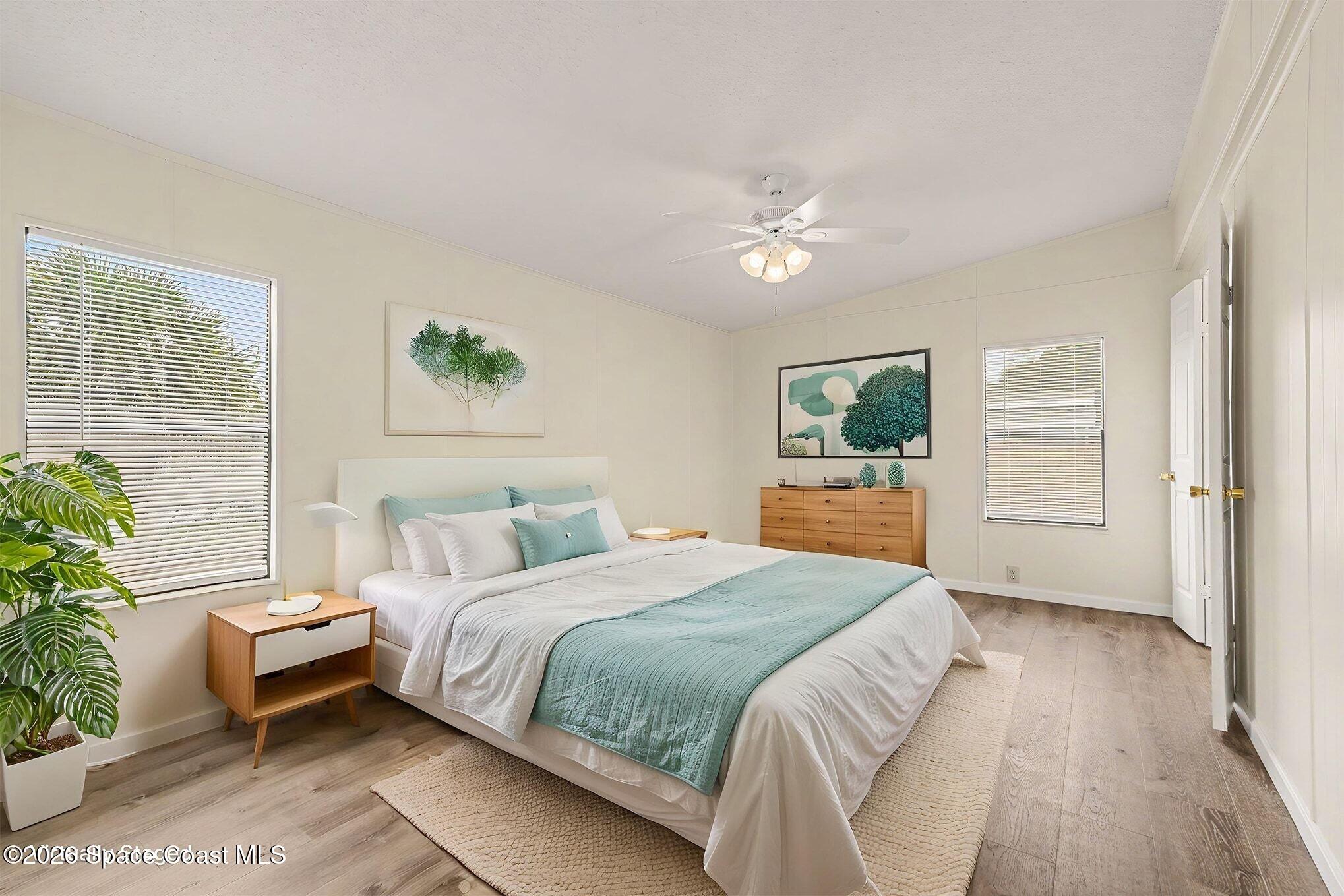 604 Breezeway Drive Cocoa, FL 32926 - Photo 14 of 26 Primary bedroom with natural light