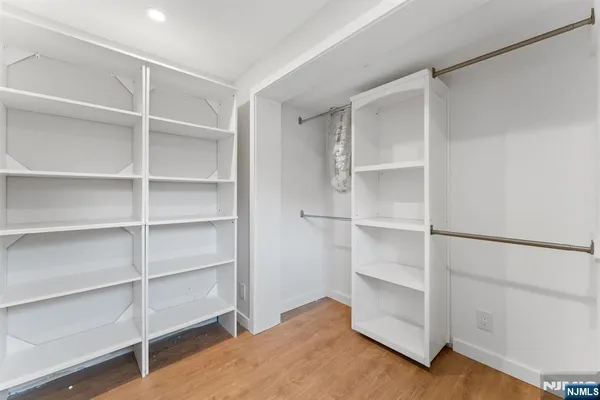 a view of an empty walk in closet