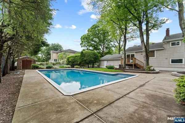 a view of outdoor space swimming pool and lake view