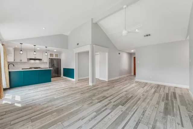 a view of kitchen and windows