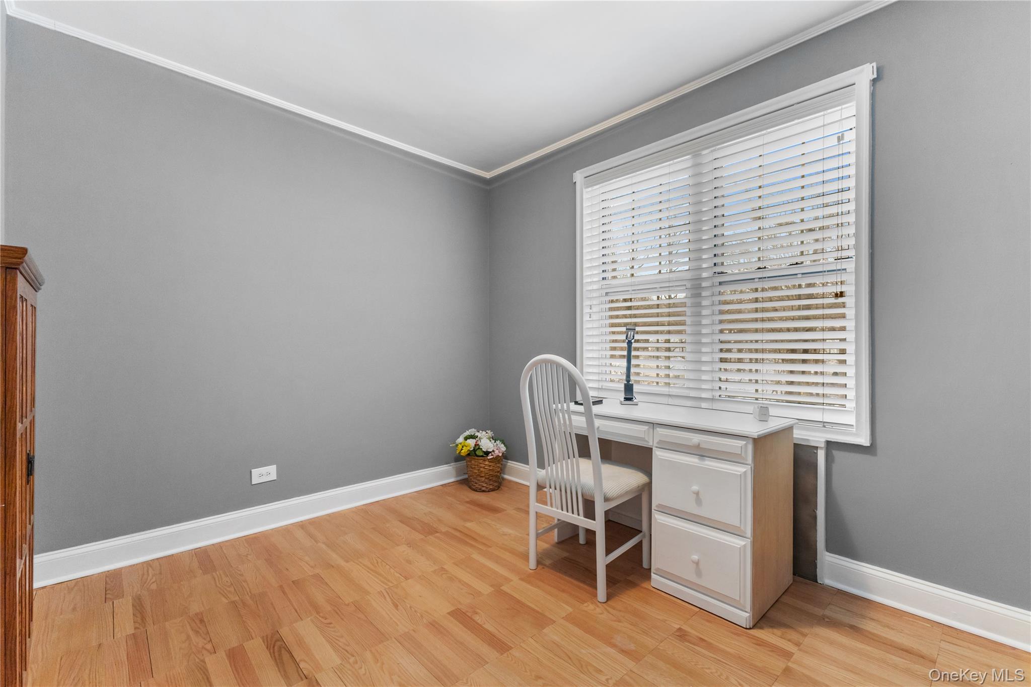 74 Pinewood Road, Unit 2F Hartsdale, NY 10530 - Photo 14 of 29 a workspace with furniture and a window