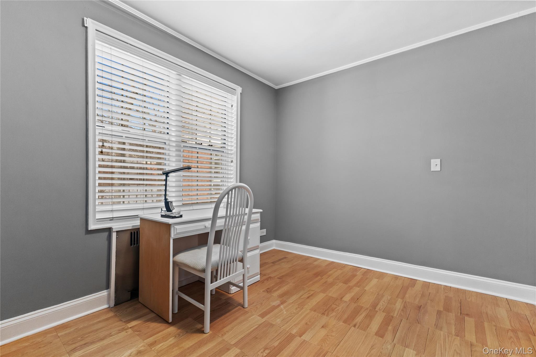 74 Pinewood Road, Unit 2F Hartsdale, NY 10530 - Photo 15 of 29 a view of a workspace with wooden floor