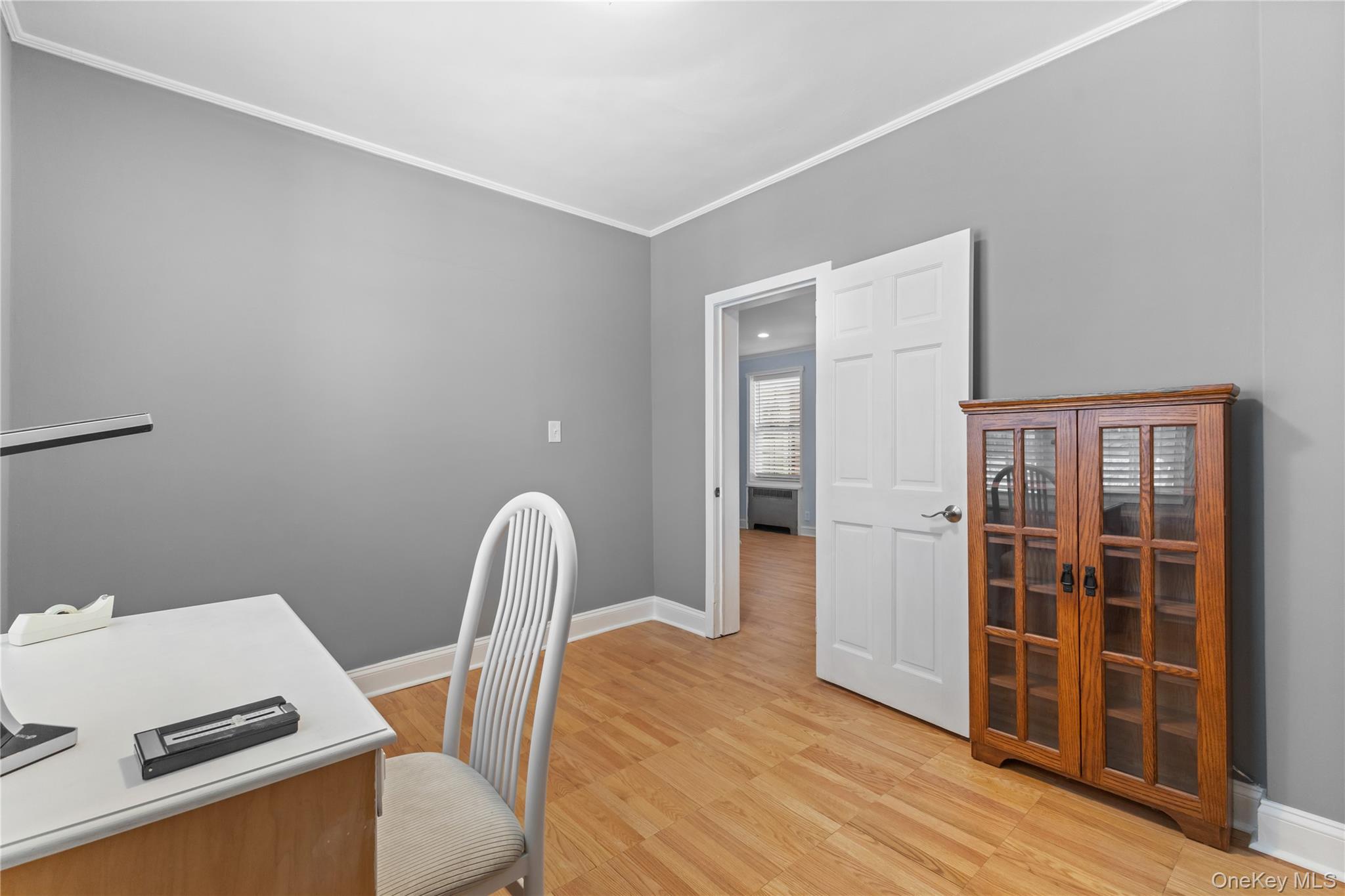 74 Pinewood Road, Unit 2F Hartsdale, NY 10530 - Photo 17 of 29 a workspace with wooden floor