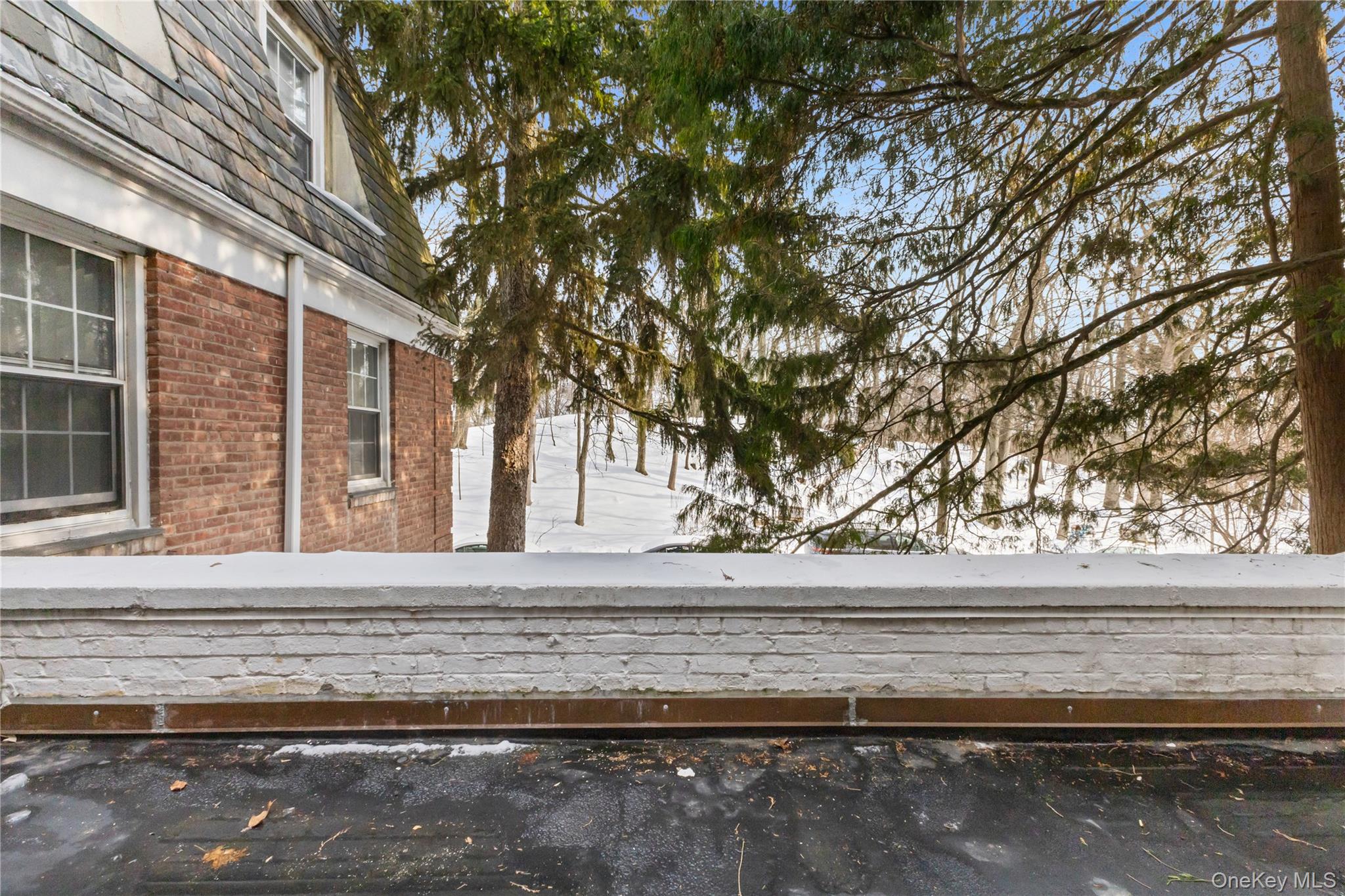 74 Pinewood Road, Unit 2F Hartsdale, NY 10530 - Photo 22 of 29 a view of a house with a yard