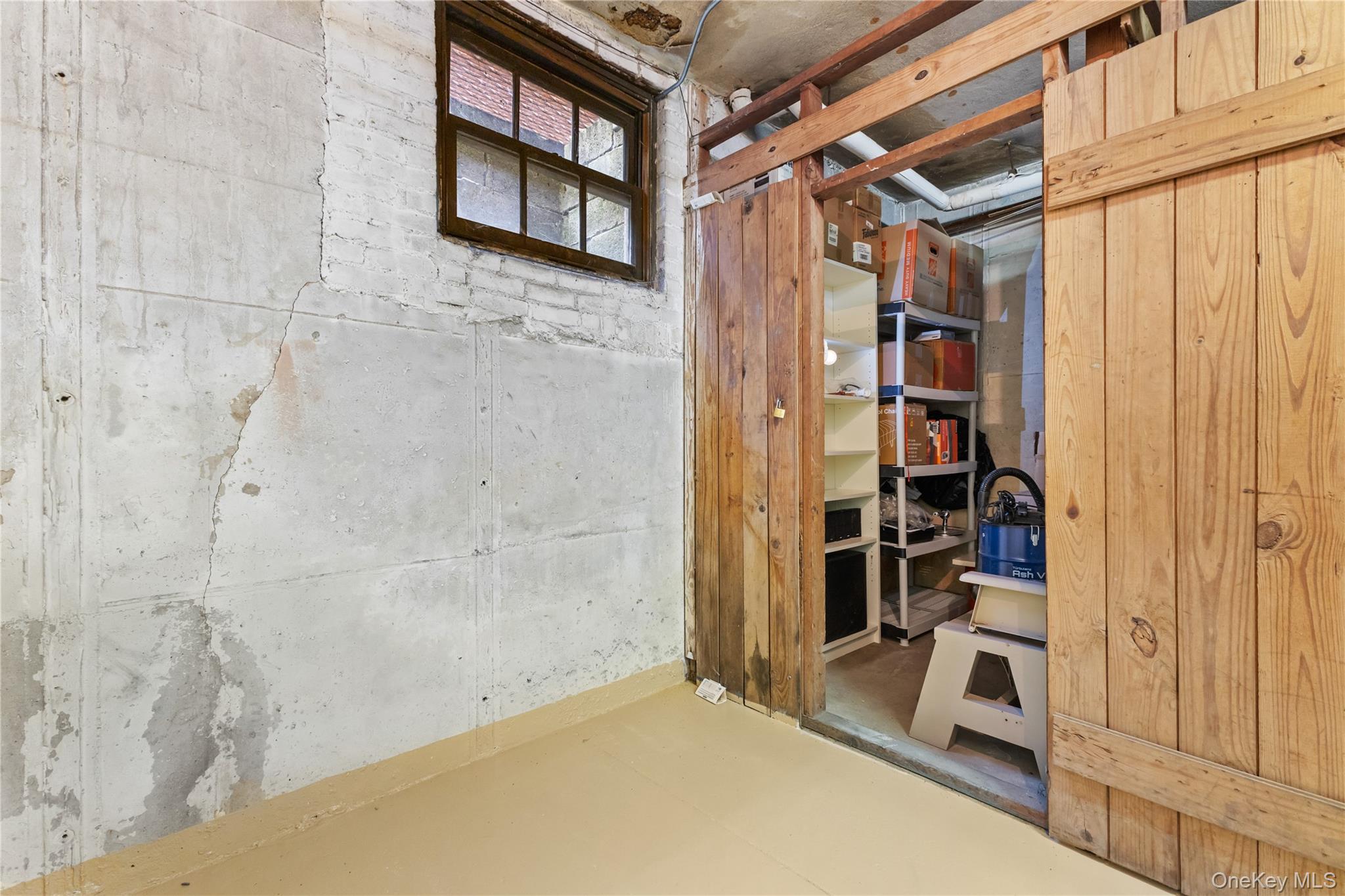 74 Pinewood Road, Unit 2F Hartsdale, NY 10530 - Photo 25 of 29 a view of walk in closet with clothes and shoes