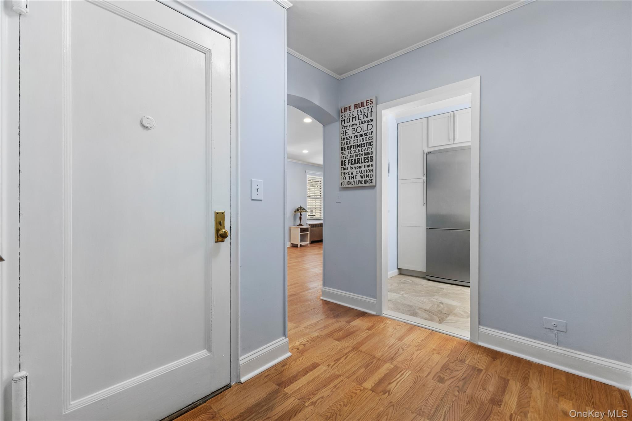 74 Pinewood Road, Unit 2F Hartsdale, NY 10530 - Photo 4 of 29 a view of a hallway with wooden floor
