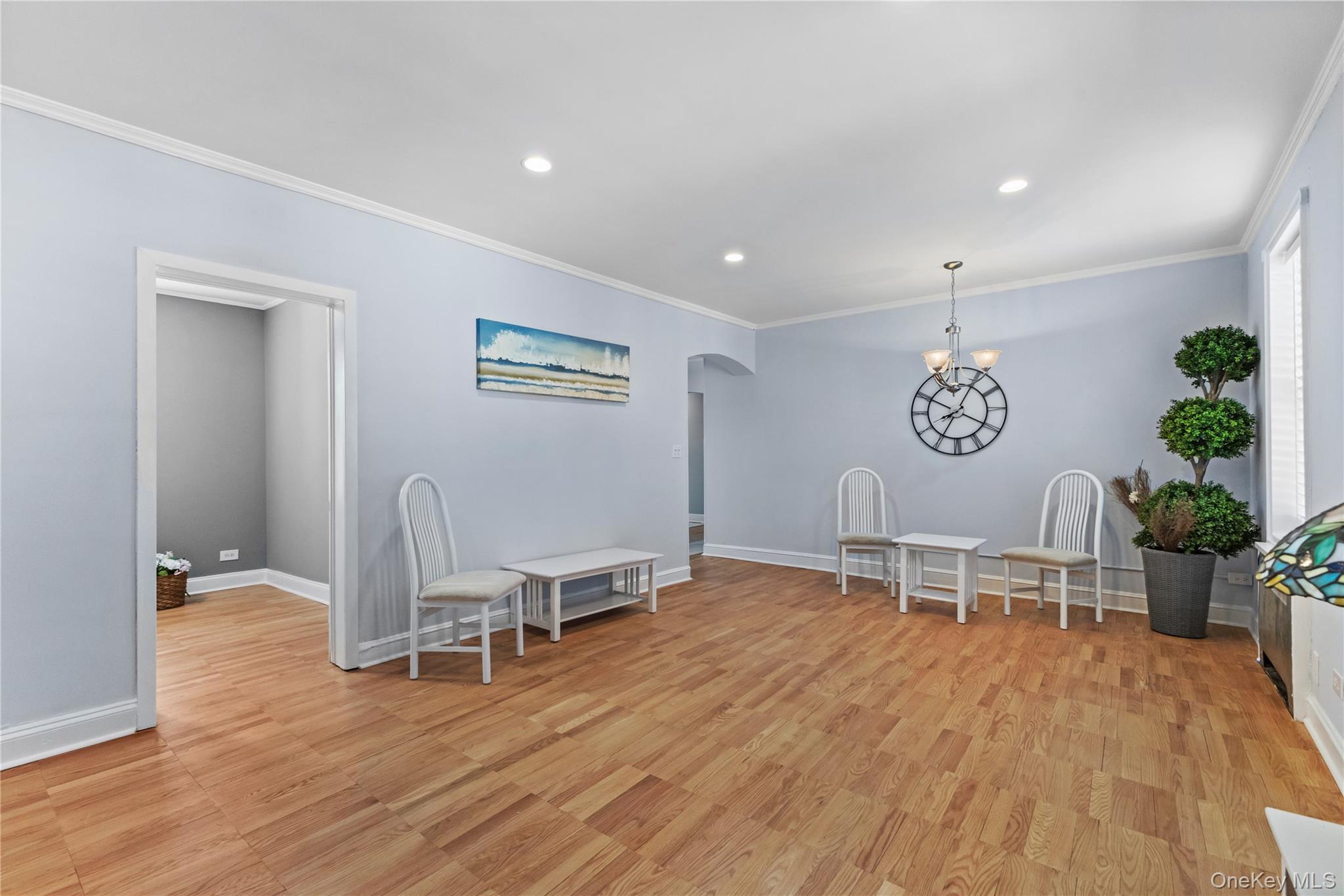 74 Pinewood Road, Unit 2F Hartsdale, NY 10530 - Photo 7 of 29 a view of a room with chairs and wooden floor