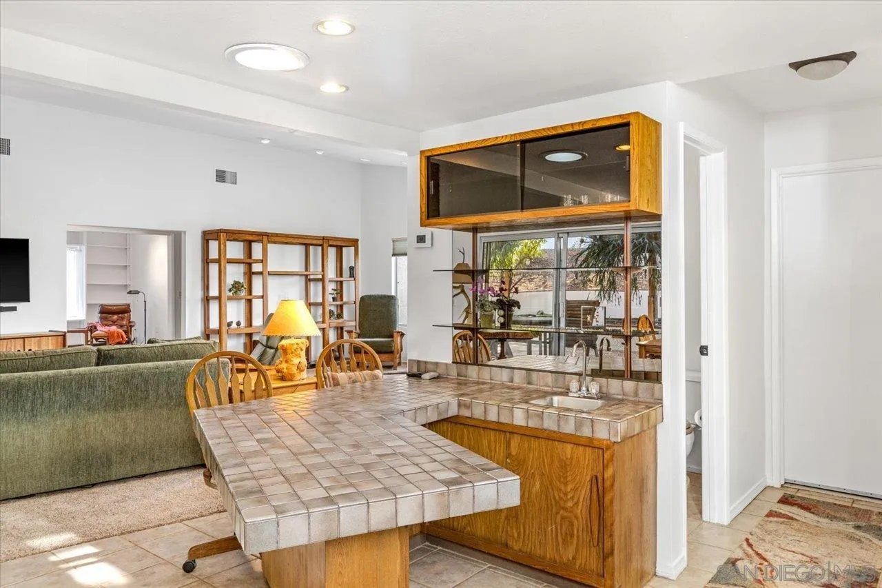 16109 Watt Way Ramona, CA 92065 - Photo 14 of 51 a living room with furniture and a window