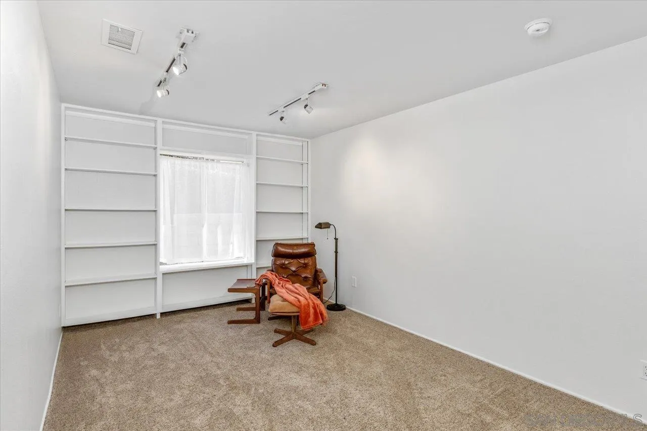 16109 Watt Way Ramona, CA 92065 - Photo 31 of 51 a view of a room with a desk and chair