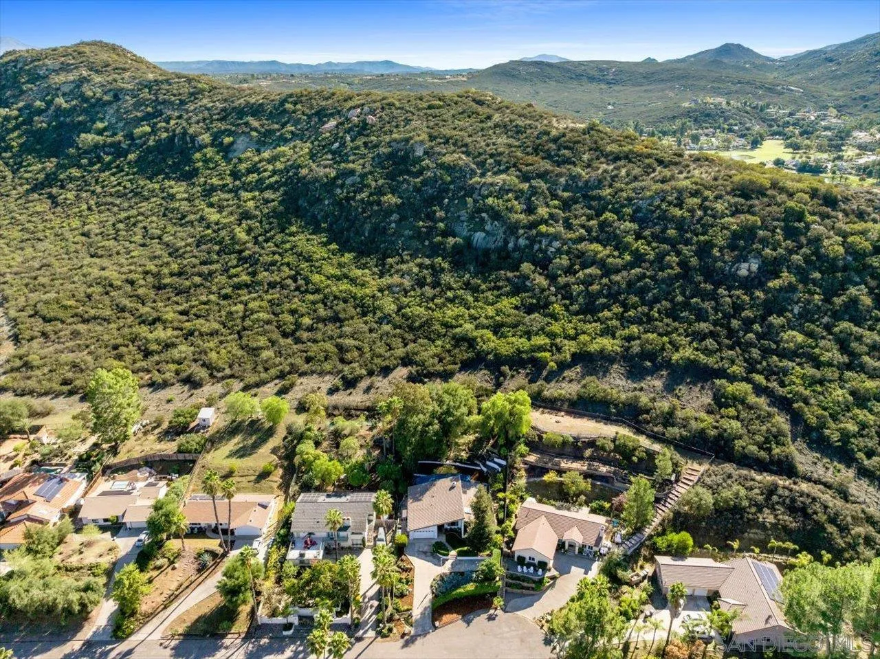 16109 Watt Way Ramona, CA 92065 - Photo 33 of 51 an aerial view of residential house with green space and mountain view