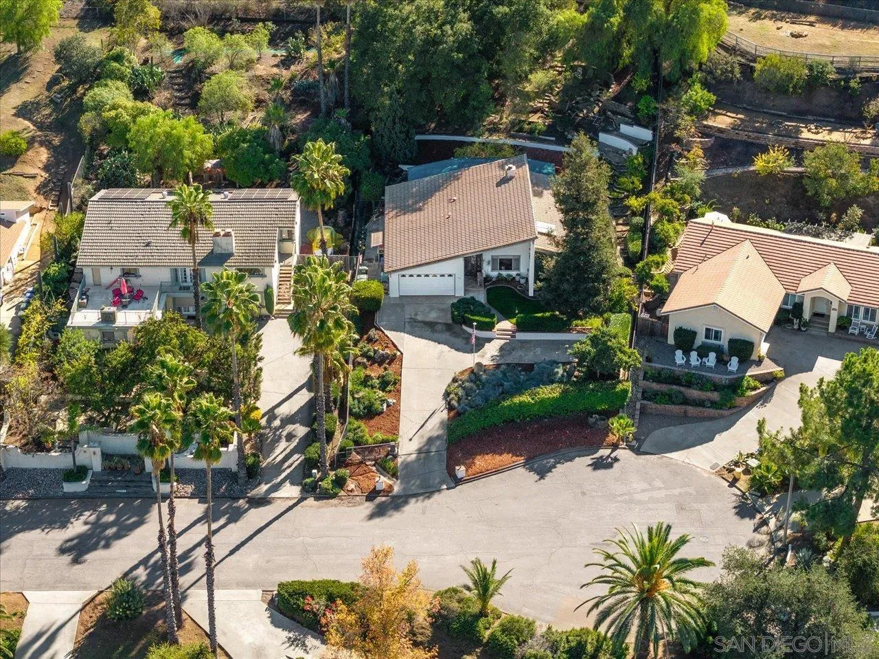 16109 Watt Way Ramona, CA 92065 - Photo 34 of 51 an aerial view of a house with a yard and a large tree