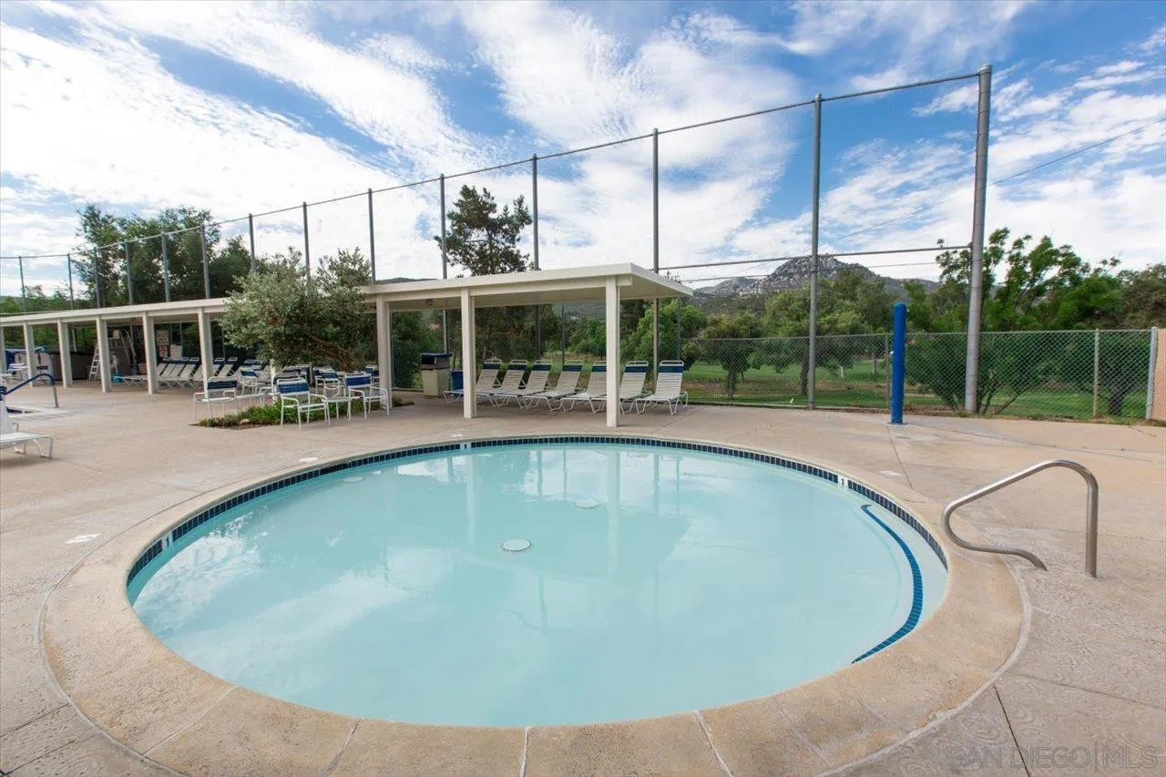 16109 Watt Way Ramona, CA 92065 - Photo 41 of 51 a view of a swimming pool with a patio