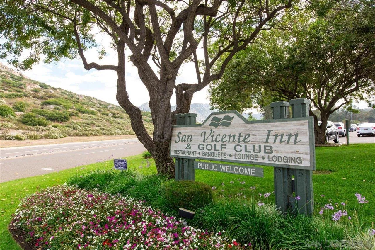 16109 Watt Way Ramona, CA 92065 - Photo 43 of 51 a sign that is sitting in front of a tree